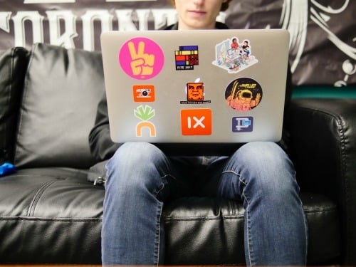 student with open laptop