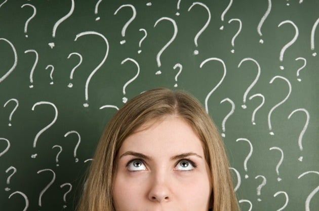Girl Question Marks on Chalkboard