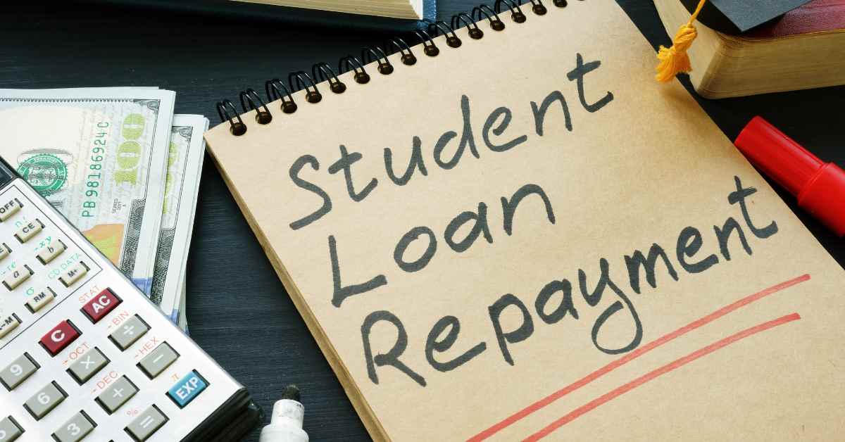 Student Loan Repayment Written on Notepad
